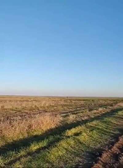 A Russian cruise missile approaches them, as seen by a Ukrainian soldier.