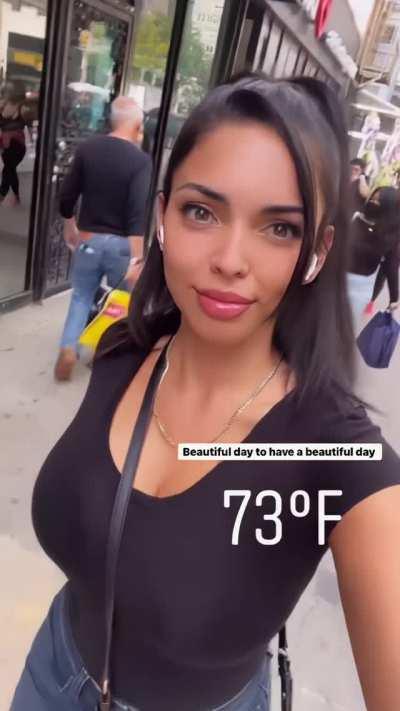 Tara bouncing along the sidewalk