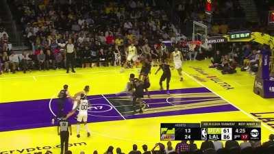 [Highlight] Talen Horton-Tucker throws it up for an assist as he falls to the floor