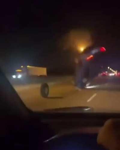 Car flips multiple times because of a moving tire on highway