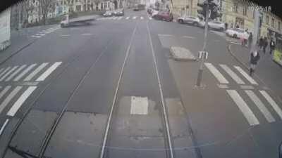 Car crushed between 2 trams