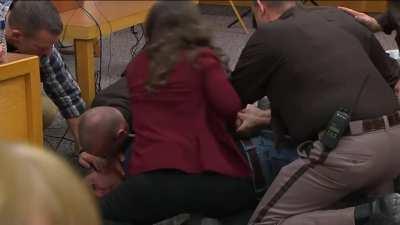 Father of victims lunges at convicted rapist Dr. Larry Nassar in court