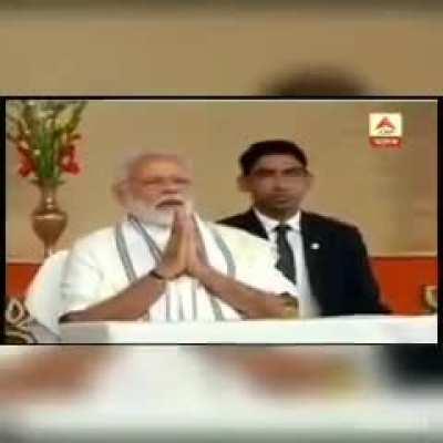 As soon as Modi noticed the camera gazing at him, he started praying.