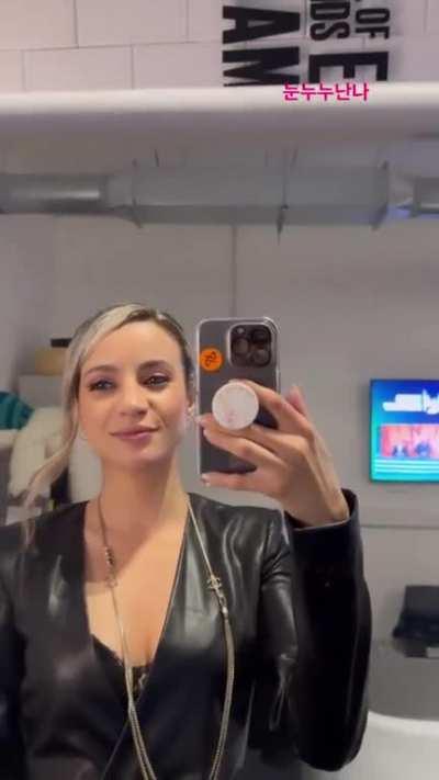 Mommy is looking hot even without showing too much, those legs make every outfit perfect