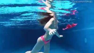 Tiffany Tatum pulls off her pink bandeau and bottoms underwater