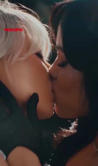 Jenna Ortega kissing Sabrina Carpenter in Sabrina's Music Video 