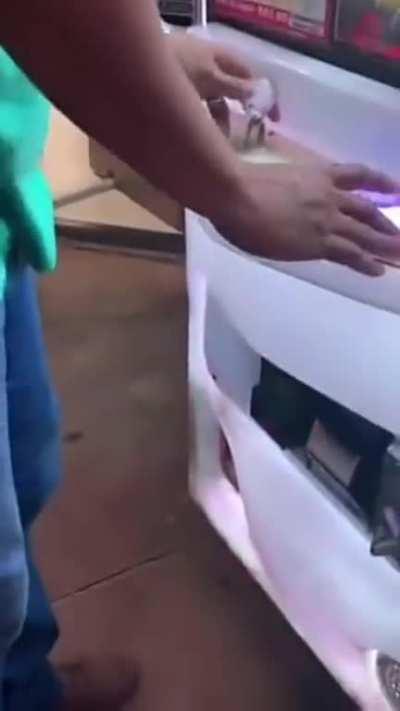 to collect a plush toy from a claw machine