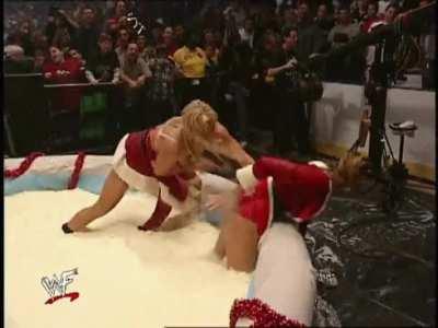 torrie wilson whips stacy keibler's ass hard on mud