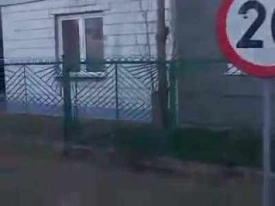 Guy punches a traffic sign