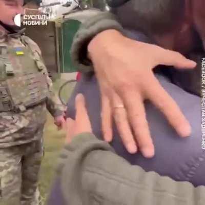 Mother welcomes her son liberating their town.