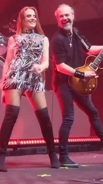 Simone Simons having fun on stage