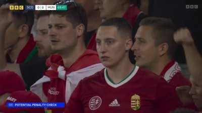 Footballer falls when try to stop a freekick