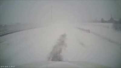 Highway turns into bowling alley in near-zero visibility conditions