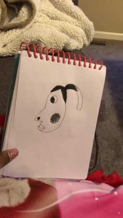 Little girl's potrait of mom sends dad into a laughing fit