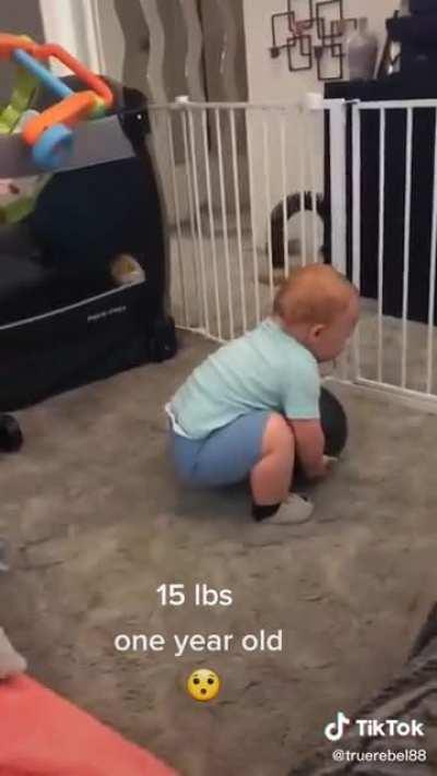 One year old vs 15 pound medicine ball