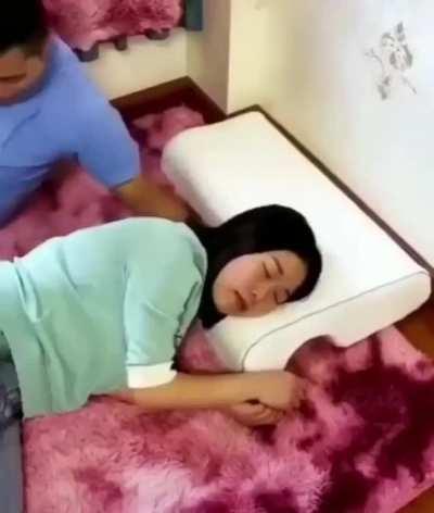 This new pillow has a hole for your arm.