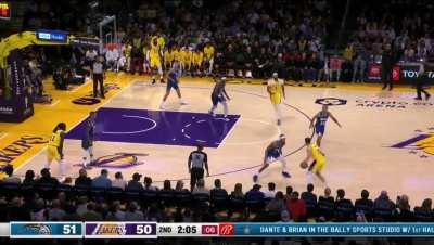 [Highlight] Jalen Suggs has Austin Reaves in jail and knocks the ball off his leg to force the turnover!