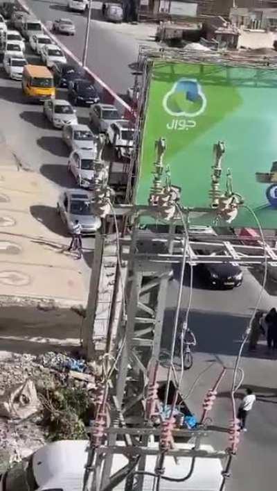 Masked gunmen controlling the entrance of Ramallah city