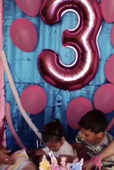 Girl gets her birthday candles blown out...