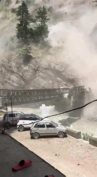 Landslide takes out a bridge in Himalayas, India