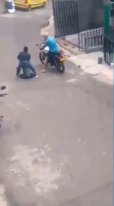Trying To Steal a Manhole Cover