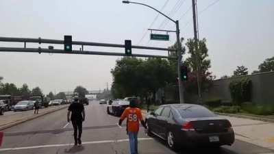 Jumping on top of a moving police car