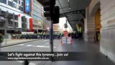 Tyranny in Melbourne. Victoria Police storm the streets. I've never seen a wall of police like this.