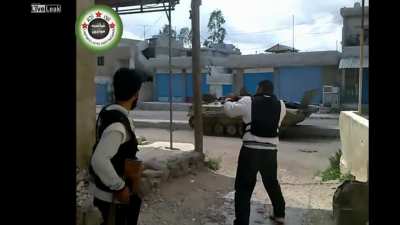 Group of Syrian rebels taking a direct hit from a Syrian Army BMP-1. Circa 2012, Syria.