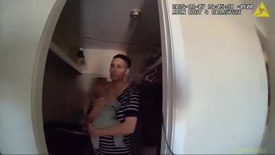 Missouri police fatally shoots mother and her 2-month-old baby after mother approached officers with kitchen knife.