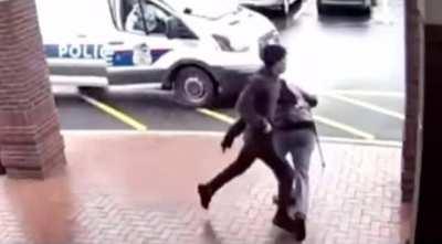 Armed man gets tripped by random bystander