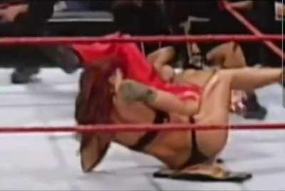 Lita's clothes ripped apart by Chyna