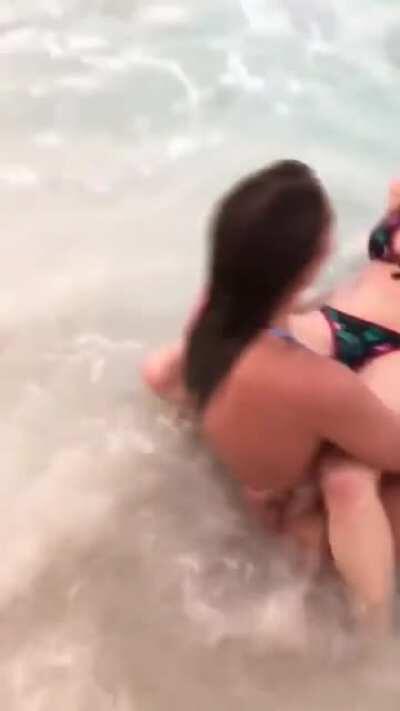 Girls Playing At The Beach