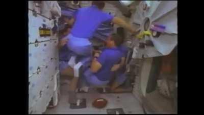 Astronauts Playing Baseball and Football (Rugby?) on the Space Shuttle