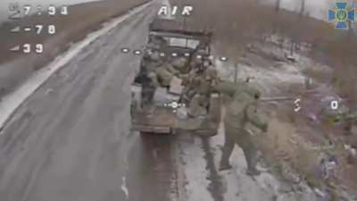 A Ukrainian FPV pilot attacks a Russian transport vehicle transferring soldiers to a front line position.