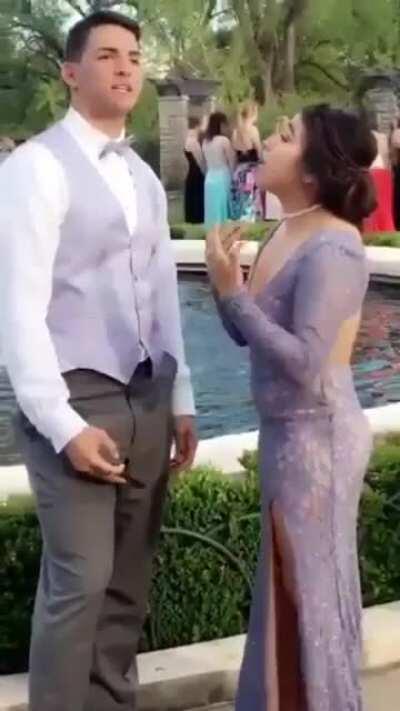 Taking a selfie with his short girlfriend