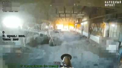 Russian fiber optic FPV drone sneak into an ukrainian warehouse to strike a Kozak IMV