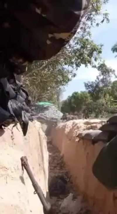 A Royal Cambodian Army soldier fires an RPG-2 (B40) with quite a unique rocket made out of an unexploded BLU-42 cluster bomblet during the Battle for Hill 350 at Thai Forces, 16 December 2024