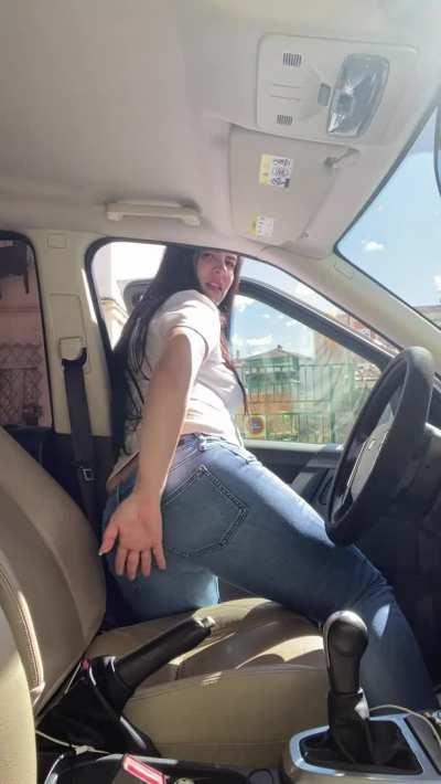 farting on the street in a leather car seat