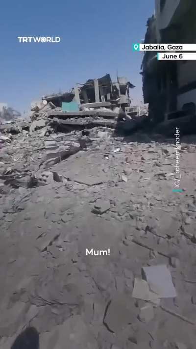 A Palestinian journalist cries out in horror as he returns to find 48 members of his family killed in an Israeli air strike