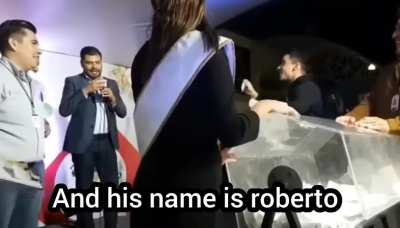 Guy gets caught pulling his own name out of the raffle for a car.