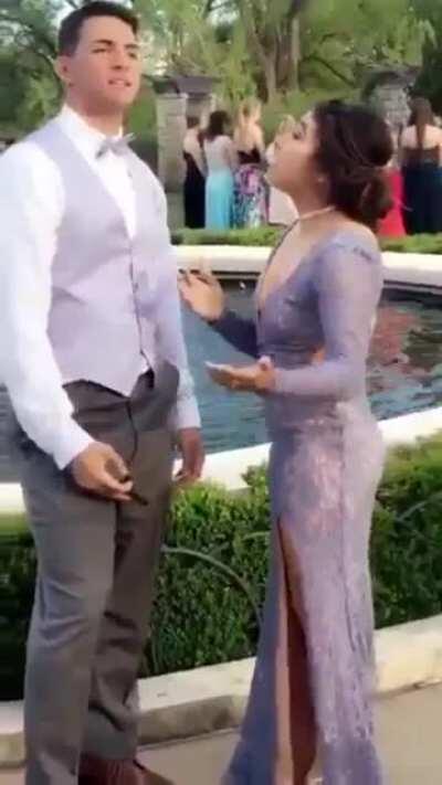 Taking a selfie with his short girlfriend