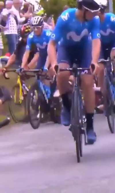 Woman blocks cyclist in a race