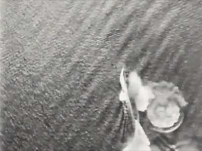 US dive bombers engaging an Imperial Japanese Navy cruiser force off the coast of Rabaul in November 1943