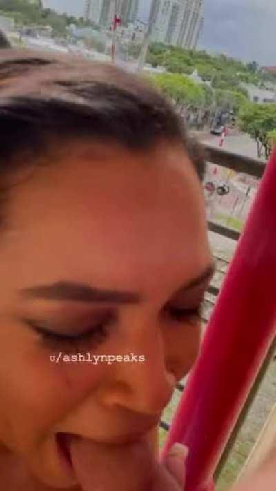Busty Latina Servicing a White Dick on The Balcony as People Walk By