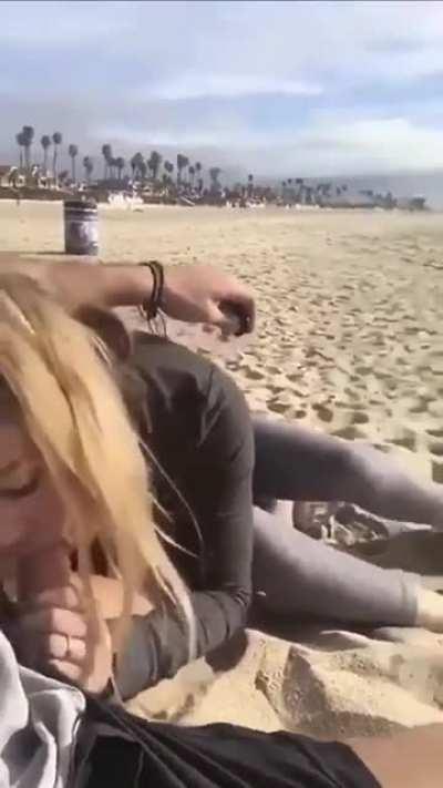Blowjob On The Beach