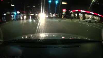 Idiot on bike blows red light and gets hit.