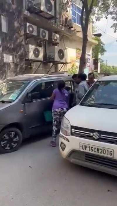 Somewhere in Delhi, first 5 seconds you can see her number plate, gussa apni jagah hai but 15 sec mein 10 thappad for a minor scratch