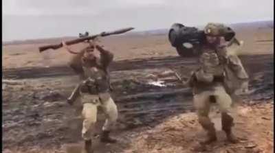 Ukrainian Soldiers waiting for a Russian tank to arrive