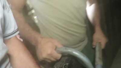 IDF shows footage captured from Hamas showing them building the big tunnel unearthed today