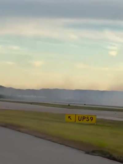 Full view of UPS plane crash with impact at end of runway. NSFW *Language*